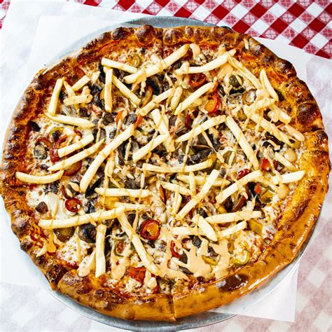 Fat daddy's pizza - About Fat Daddy’s Pizza: With a few tables, a few TVs, and some of the most topping-laden pizzas you’ll ever devour, Fat Daddy’s is a consistent appetite-pleaser. It’s located in Santa Rosa Beach, on the north side of Highway 98. 